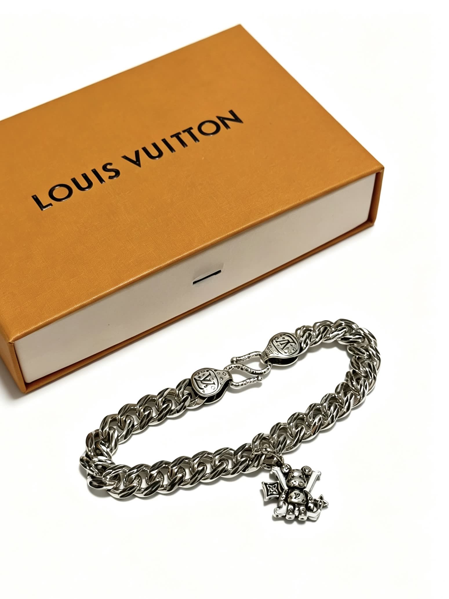 Louis Vuitton Silver Tone Bracelet with Monogram Charm